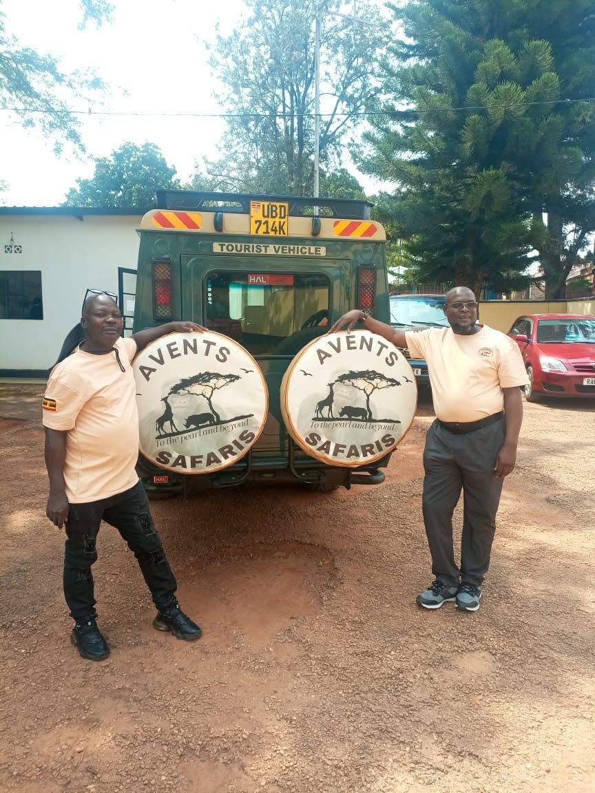 Avents Tour Safaris team beside their branded tourist vehicle in Uganda